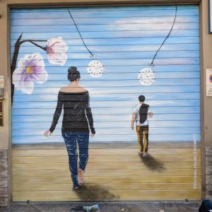 Ancora una saracinesca abbellita con ‘Coloriamo la città’