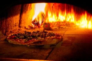 New York, a rischio pizzerie con forni a legna: “Inquinano troppo”
