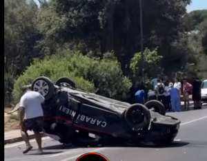 Fregene – Impatto violentissimo tra una 500 ed un’auto dei carabinieri che si ribalta in mezzo alla carreggiata (VIDEO)